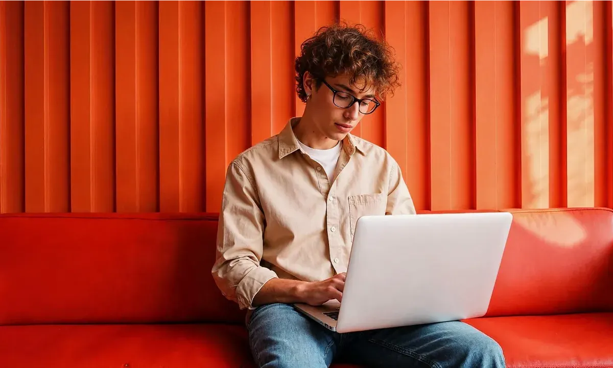 A marketer working on a laptop